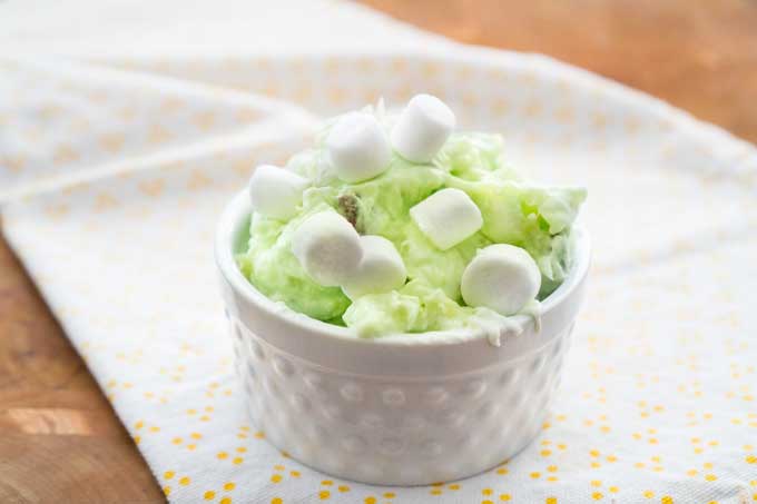 A close up of watergate salad with small marshmallows 