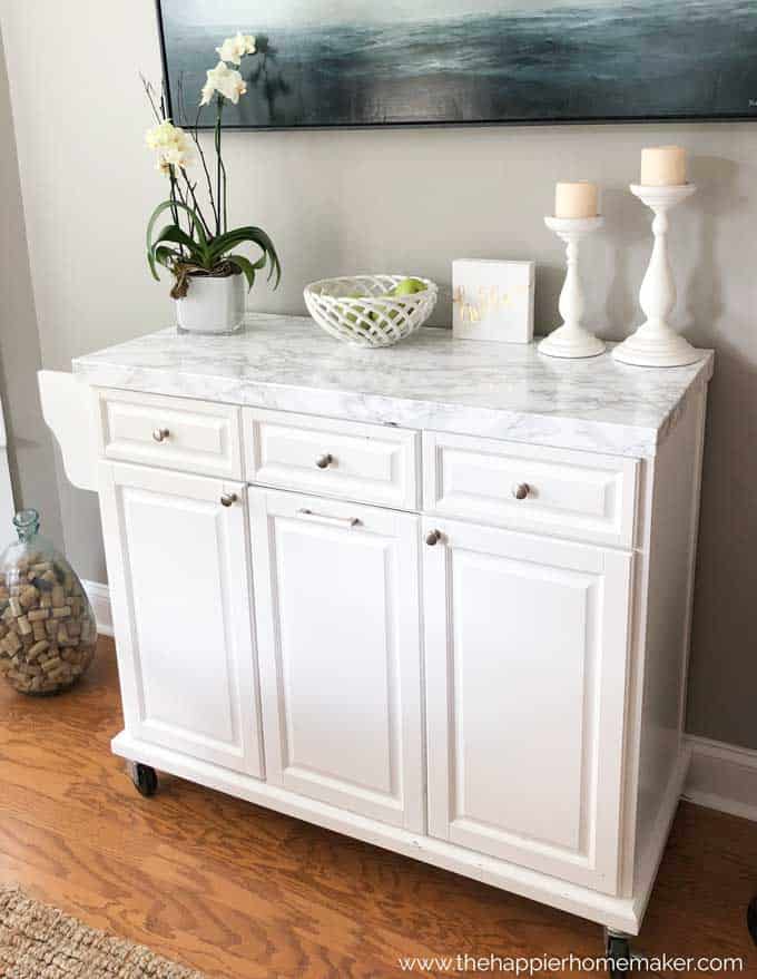 white rolling kitchen island with marble top