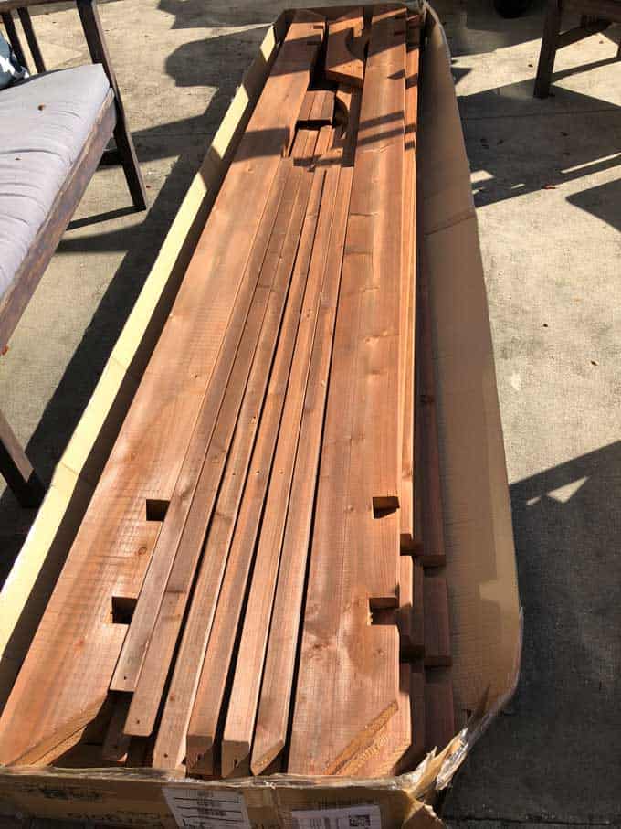wood pieces for building a pergola stacked on each other