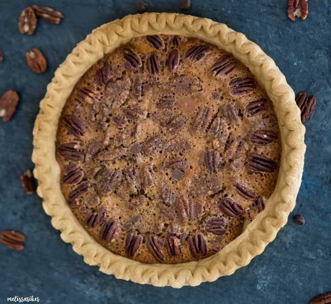 overhead view of Kentucky derby pie on dark backdrop