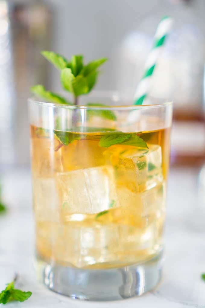 A close up of a Mint julep in a glass