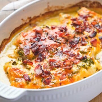 baked jalapeño popper chicken in a white baking dish