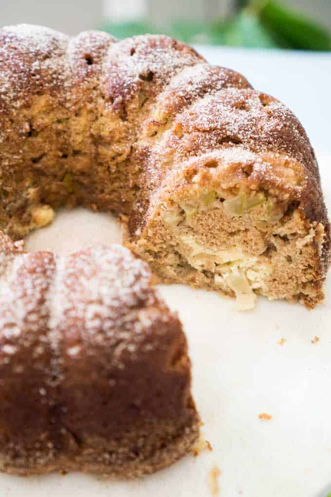 close up of apple bundt cake with slice removed