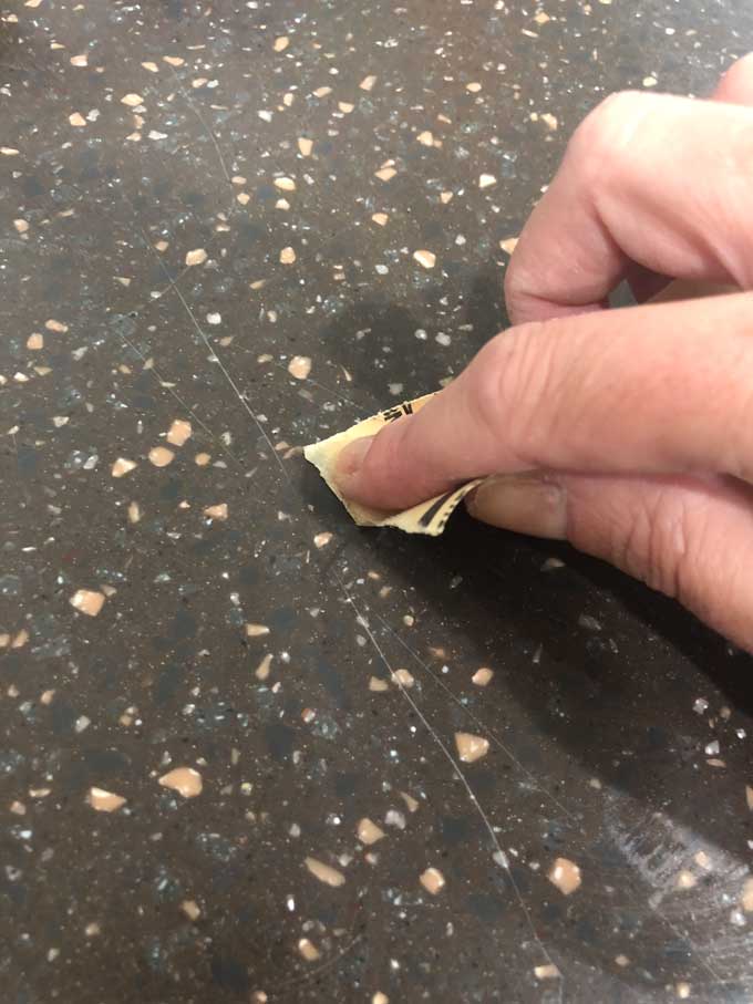 How to repair scratches in corian countertop