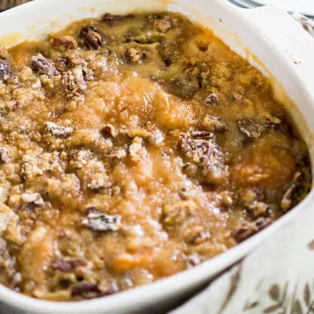 sweet potato casserole in white baking dish