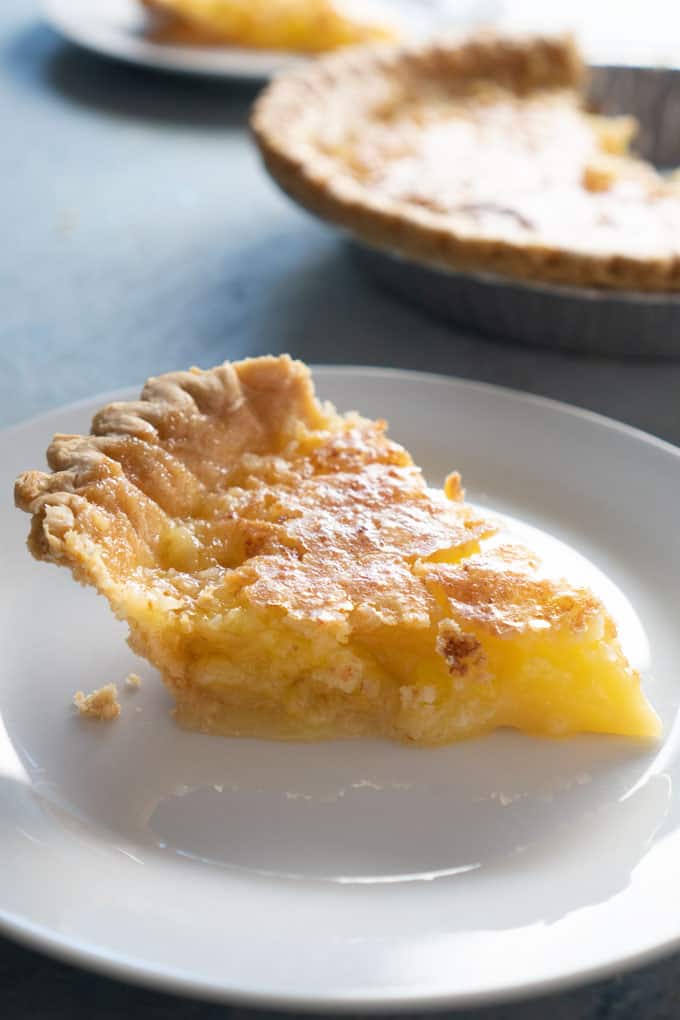 slice of coconut pie on a white plate