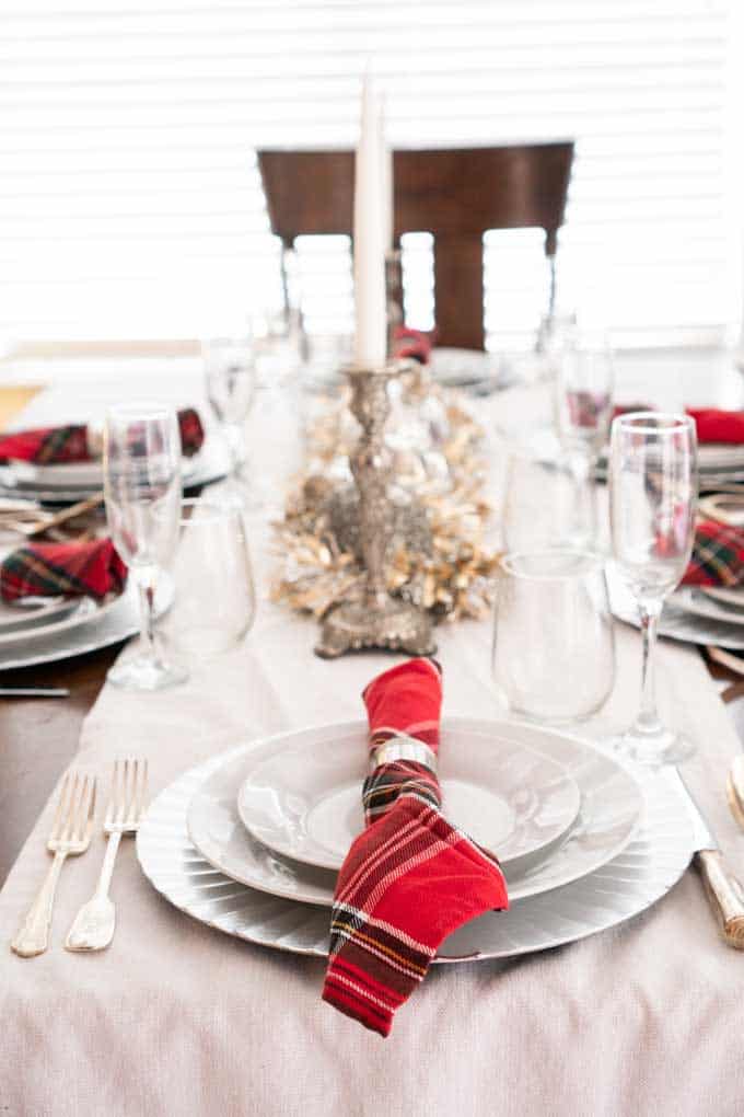 A table with colorful decorations and  wine glasses