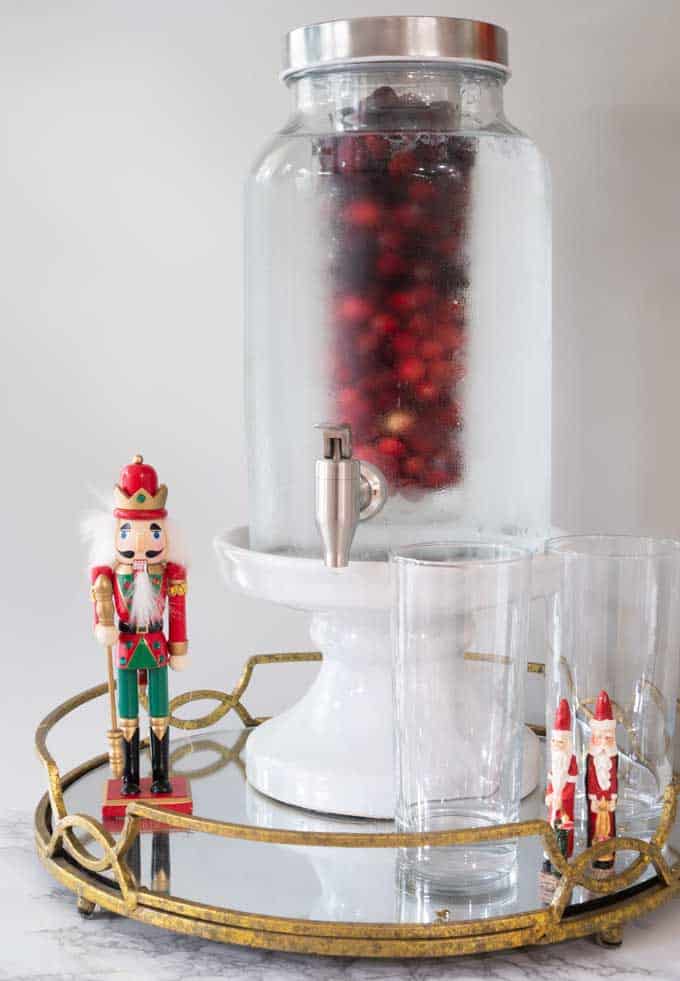 drink dispenser with cranberries inside and nut racker