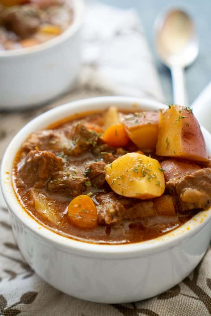 slow cooker Beef Stew in white bowls