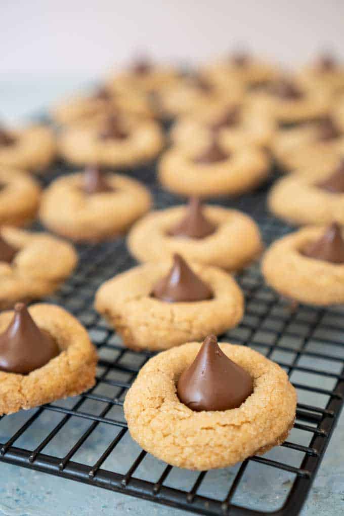 Best Peanut Butter Blossoms on cooling rack