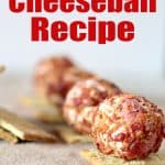 close up of mini cheeseballs on crackers with text reading cheeseball recipe