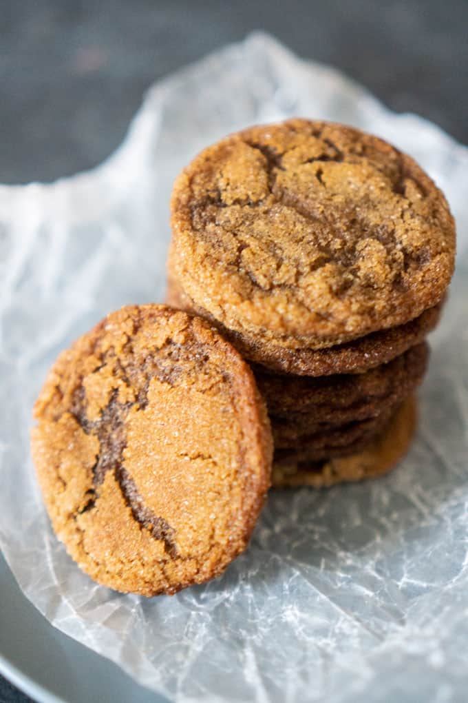 stack of Homemade Gingersnaps on parchment paper