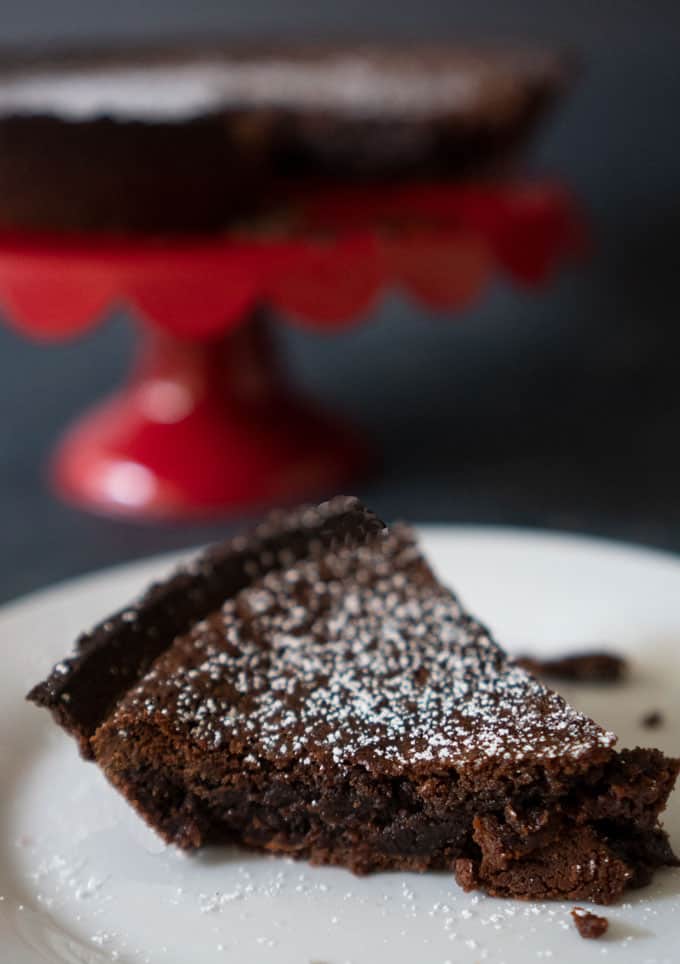 slice of hot fudge pie on white plate