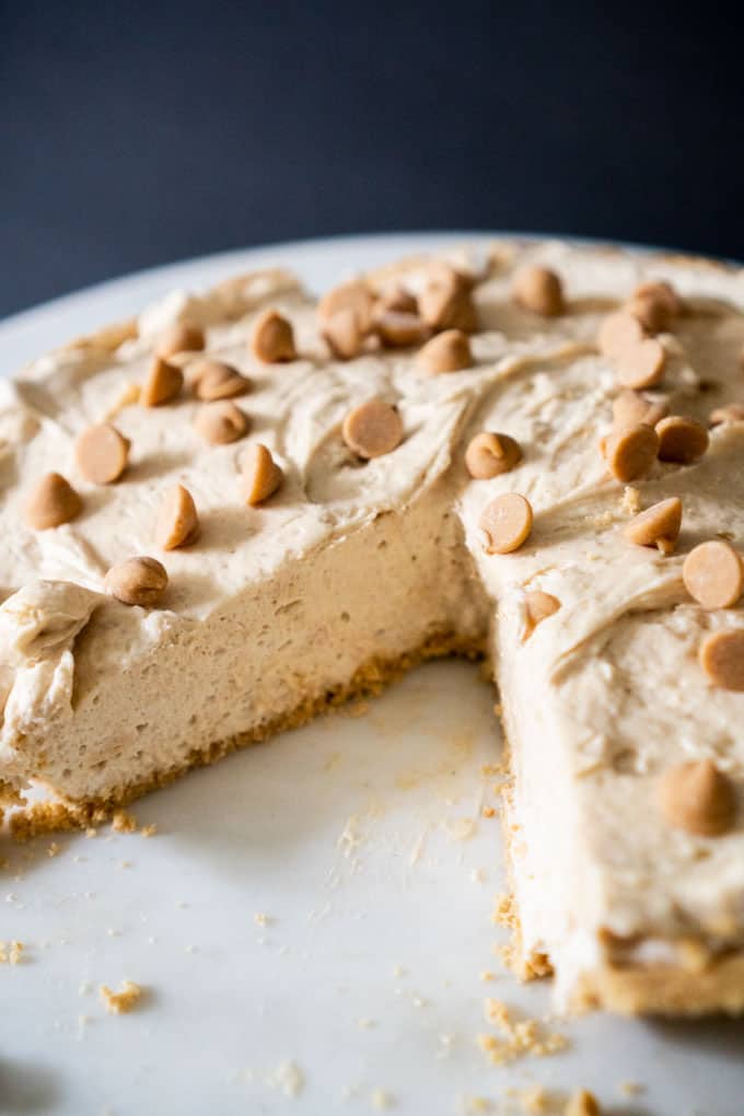 Peanut Butter Pie with peanut butter chips on top on white platter