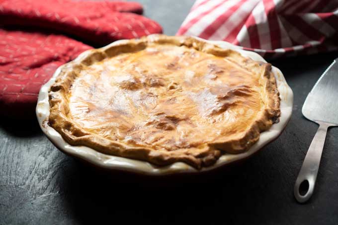 homemade chicken pot pie in ceramic pie dish