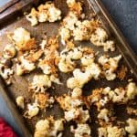 overhead view of parmesan roasted cauliflower on baking sheet