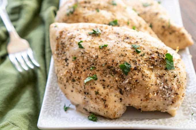 baked chicken breast on white plate