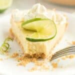 slice of key lime pie with a bite taken out