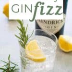 rosemary gin fizz in glass with drink name overlay