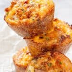 stack of egg muffins on parchment paper