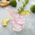 paloma cocktail with soda water and pink straw