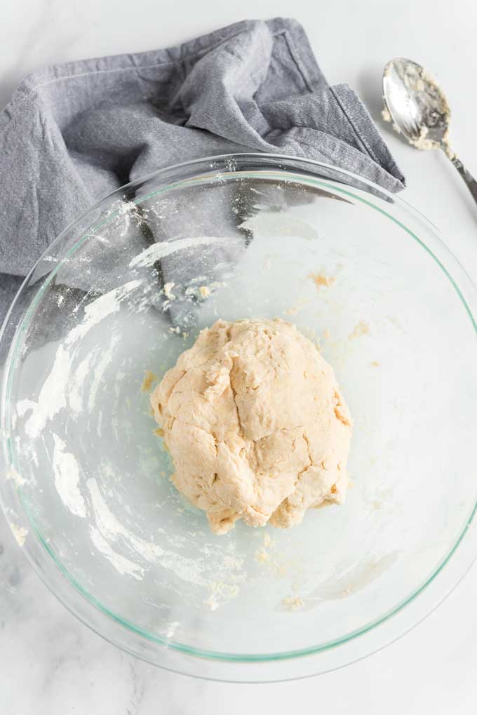 ball of drop biscuit dough in glass bowl