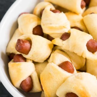pigs in a blanket in white baking dish