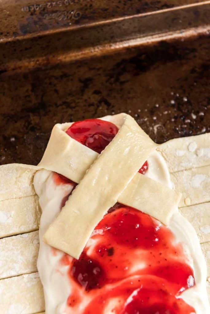 braiding puff pastry dough to make cheese danish