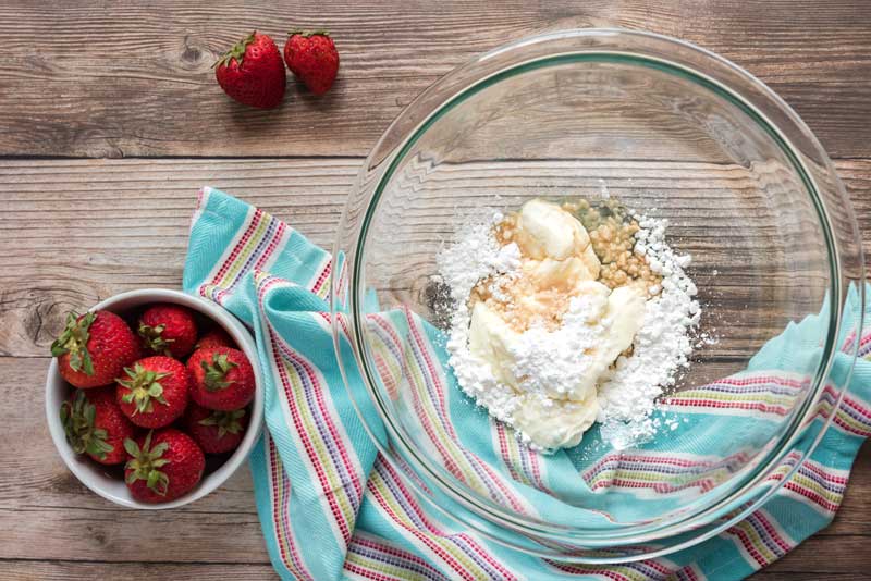 glass bowl with cream cheese and powdered sugar for danish