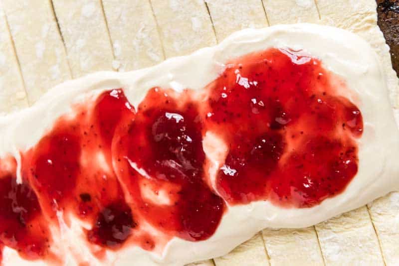 strawberry preserves and cream cheese on puff pastry
