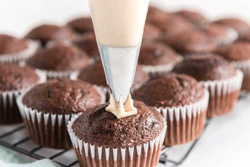 peanut butter buttercream frosting on chocolate cupcake