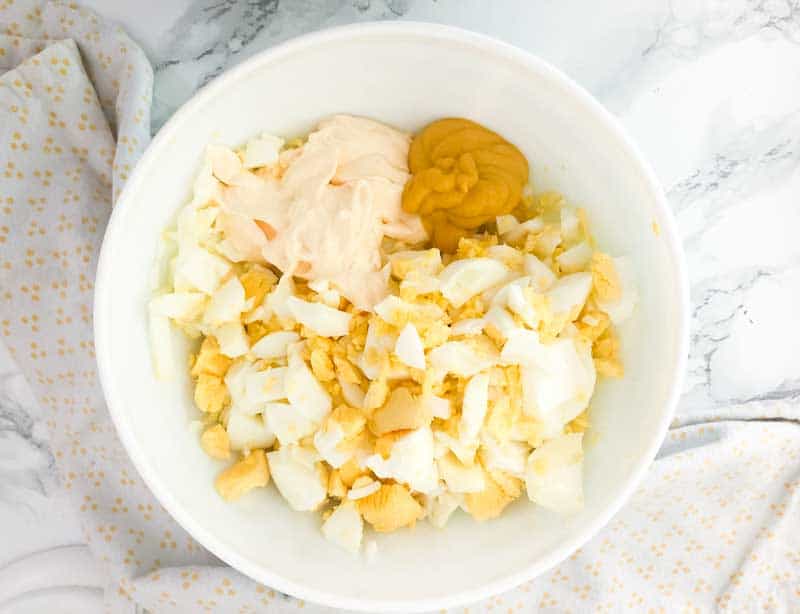 chopped hard boiled eggs with mayonnaise and mustard 