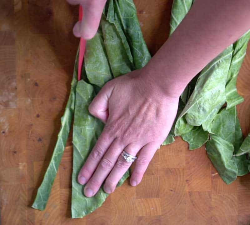 cutting collard greens stem with paring knife