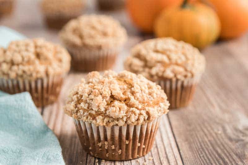 best pumpkin muffin with crumble topping on wood board