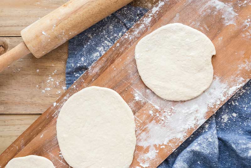 naan dough rolled flat