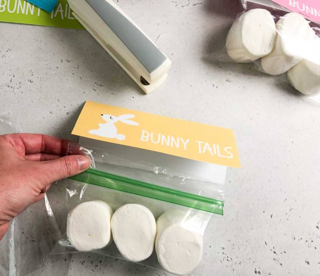 large marshmallows in plastic baggie with free printable easter bunny tail gift tag