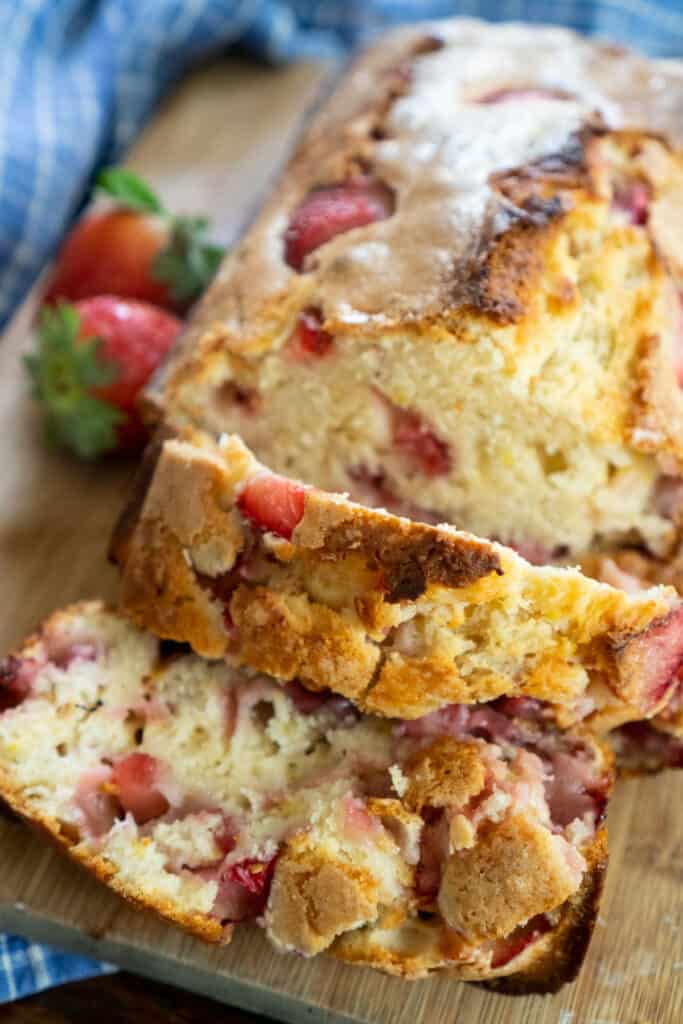 sliced homemade strawberry bread on cutting board