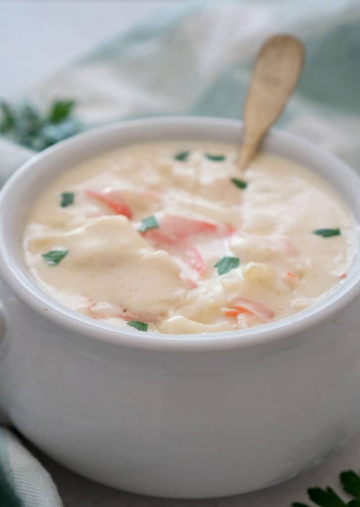 crab soup in a white bowl