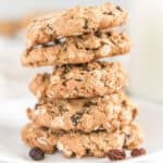 five oatmeal raisin cookies stacked on one another