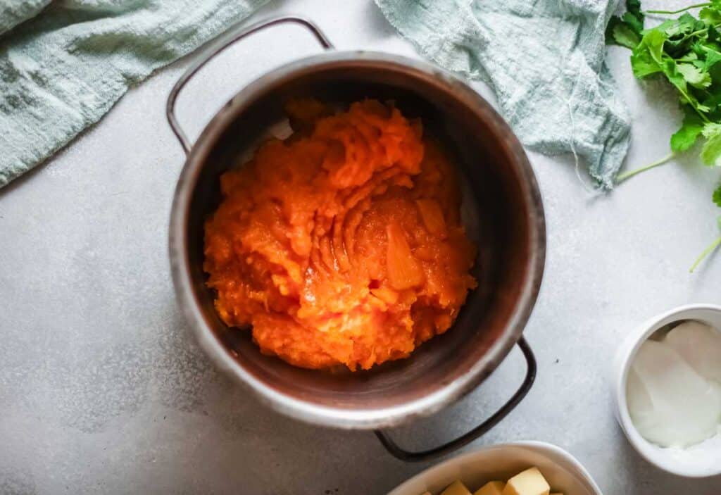 mashed sweet potatoes in pot