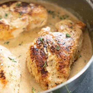creamy garlic herb chicken in pan