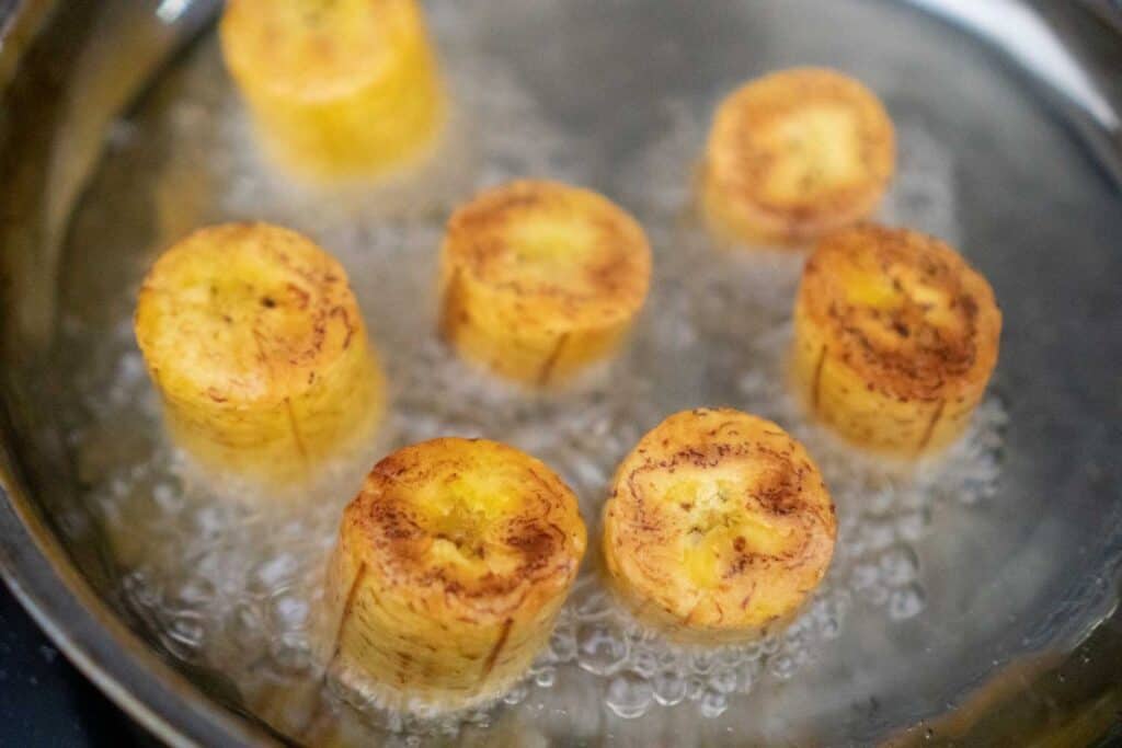 plantain slices in frying oil