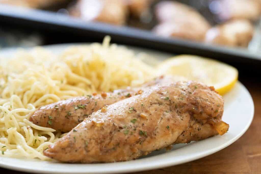 two baked chicken tenders with pasta