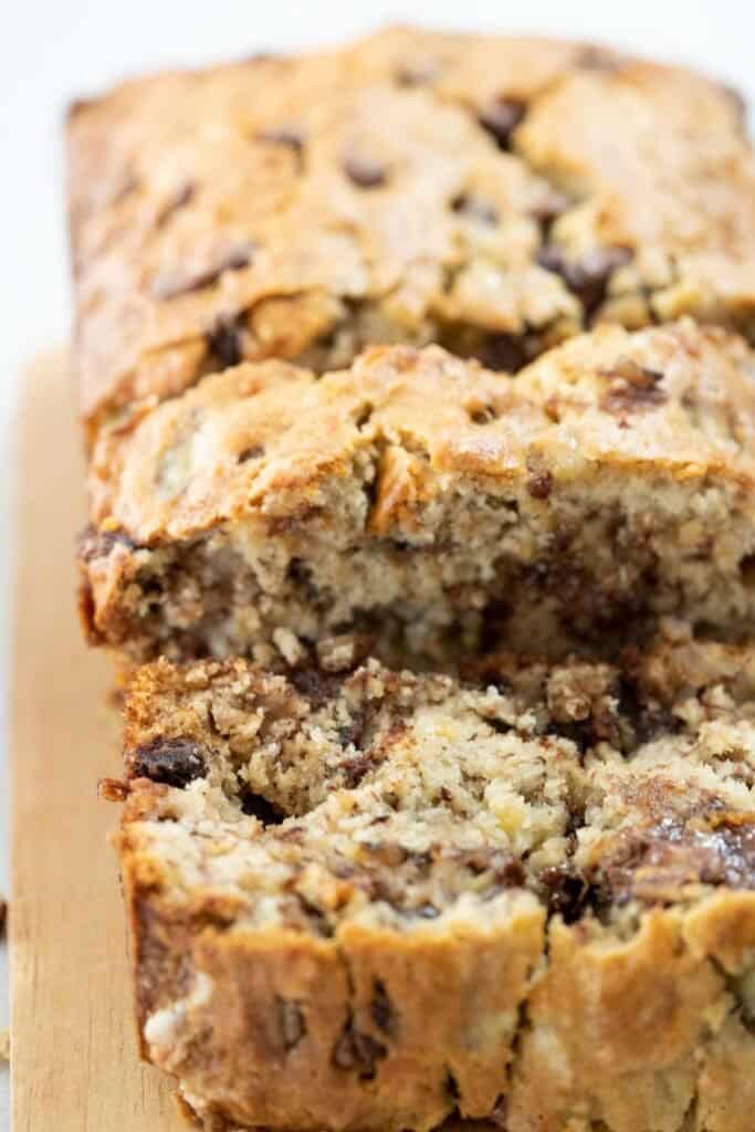 close up of sliced loaf of chocolate chip banana bread