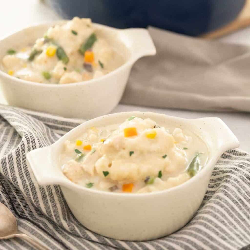 two bowls of chicken and dumplings