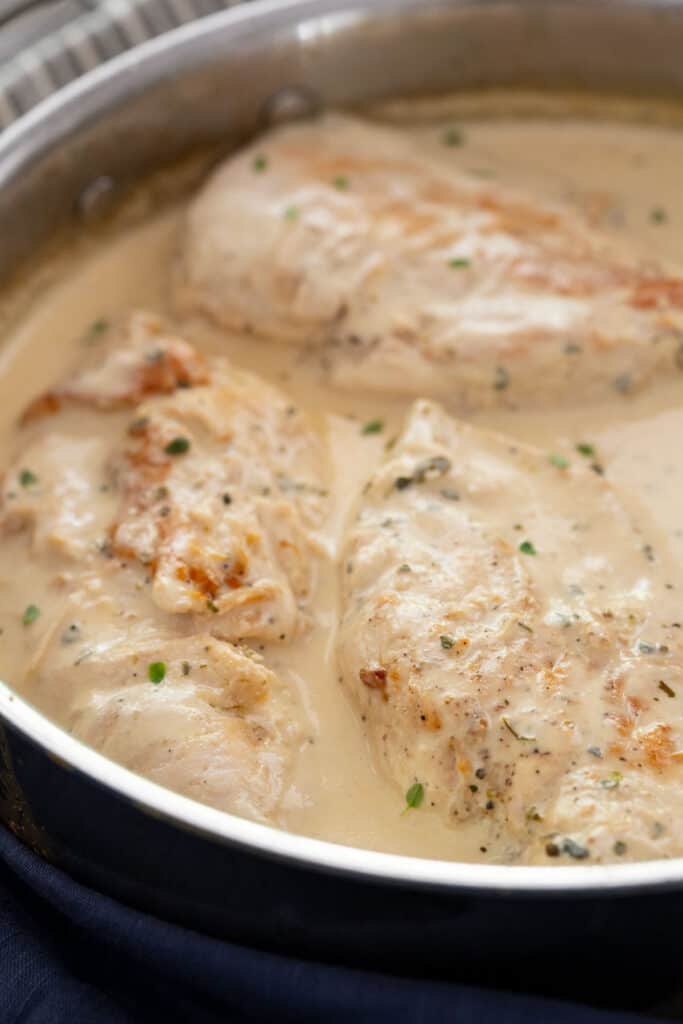 Chicken breasts in pan with dijon mustard sauce