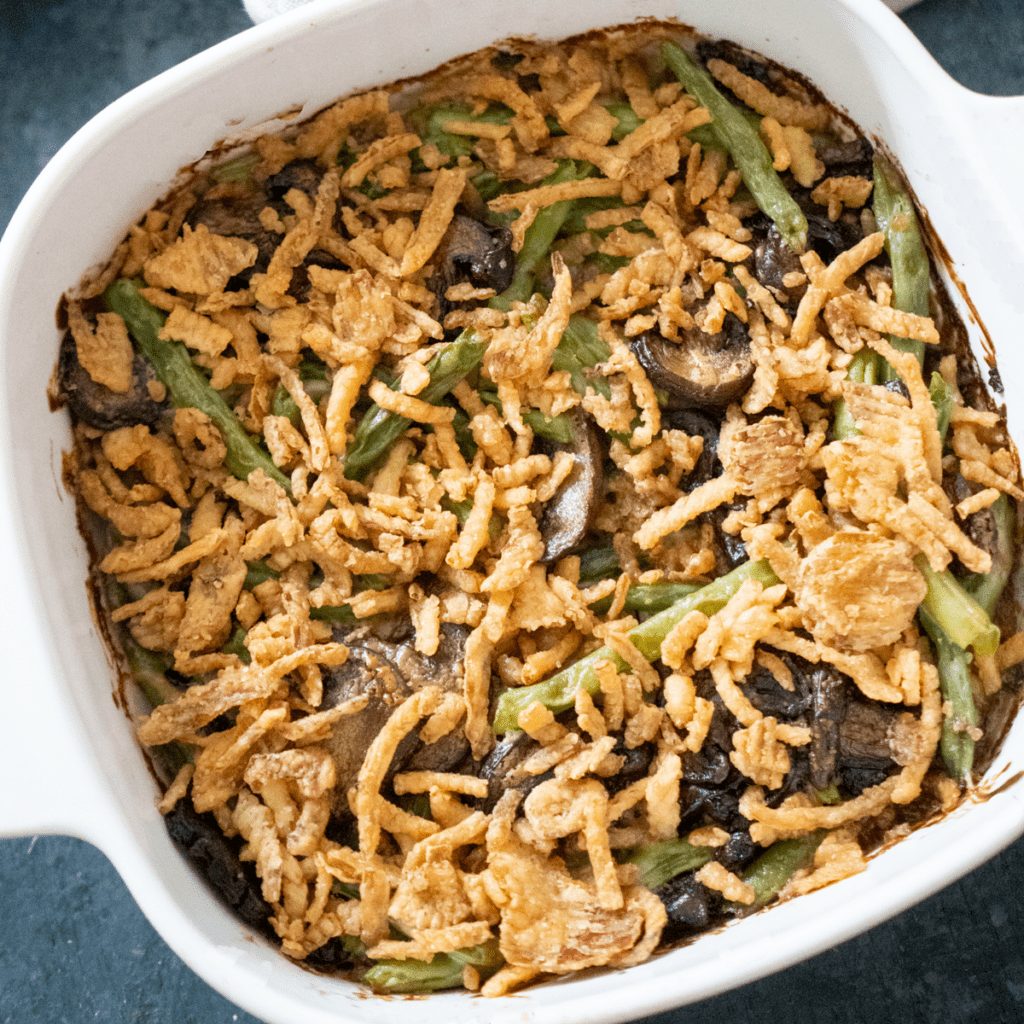 green bean casserole in white baking dish from above