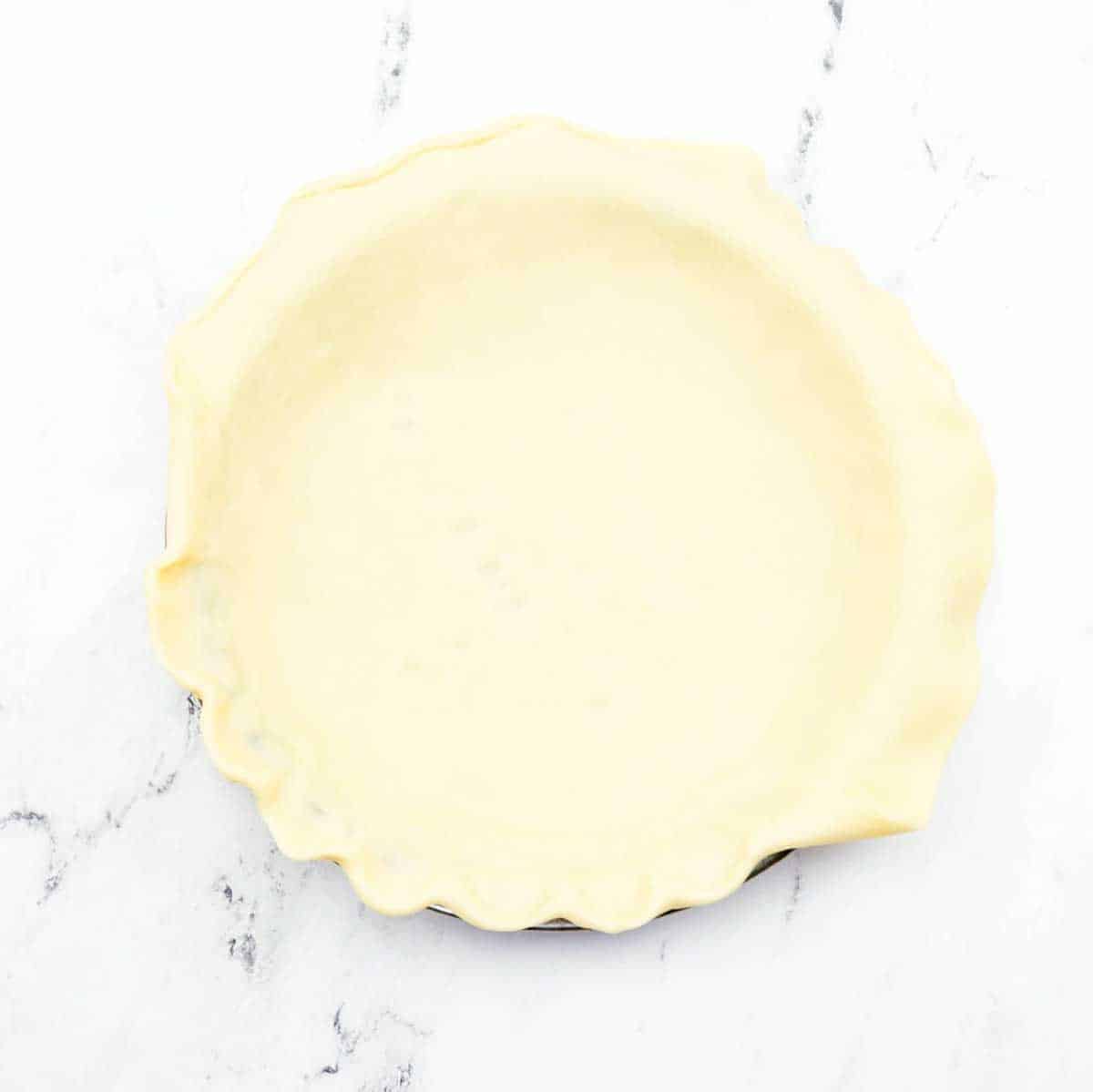 pie crust before adding filling