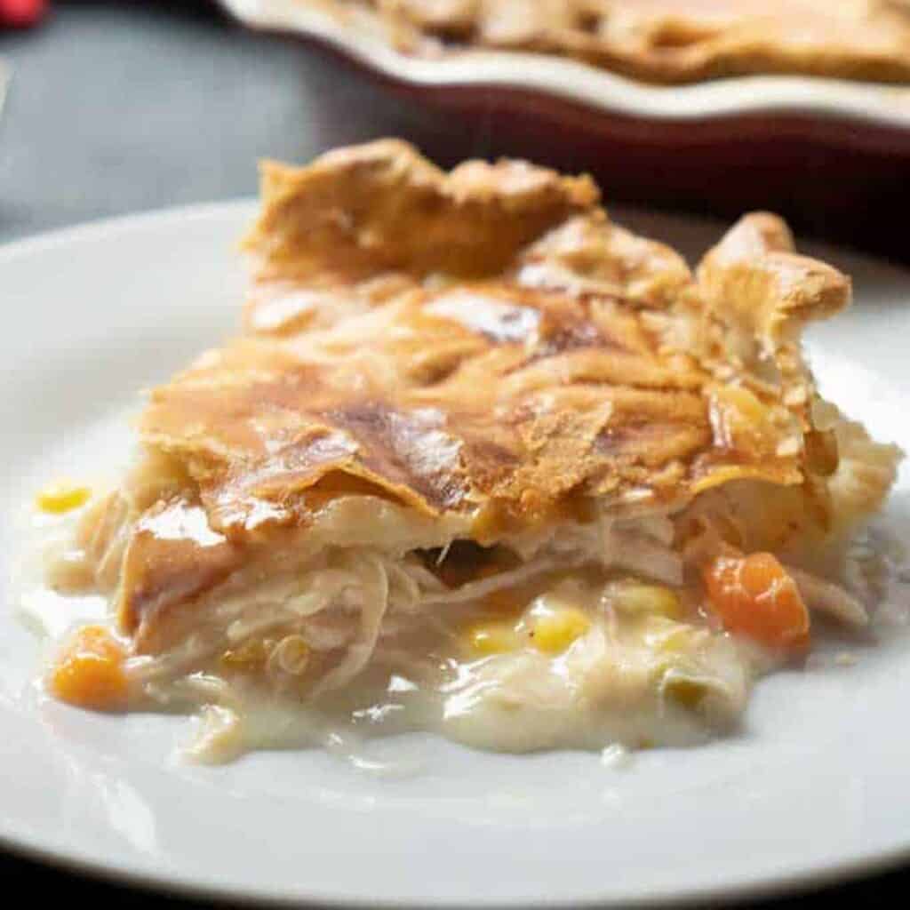 piece of chicken pot pie on white plate