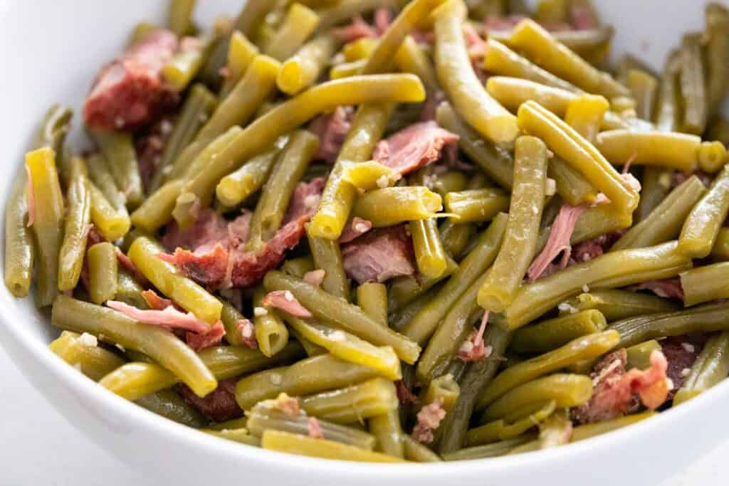 southern style green beans in a white bowl